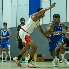 An ASB player driving past a defender from HDFC bank. These practice matches help our players adapt to different defensive schemes.