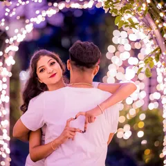 A playful and creative pose within a tunnel of lights. I guide my couples to interact naturally, capturing their unique connection with a heart-shaped hand gesture.