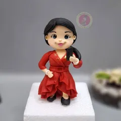 The beautiful Bharti Singh in fondant form, complete with her red dress and microphone. It's an honor to create art that celebrates such beloved personalities.
