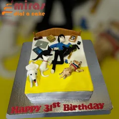 A cake for the ultimate pet lover. This design shows a person happily surrounded in bed by their beloved dogs and cats, along with a laptop and books. It's a perfect snapshot of a cozy life.