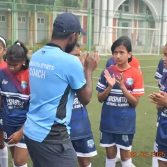 A coach motivating the U-15 girls' team during the Khelo India League. The first step is always the most important, and they took it with courage.