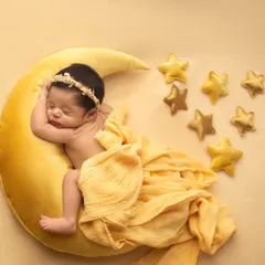 Let me create a little magic for your baby. This celestial moon and stars setup is one of my most requested themes, perfect for capturing your little one's dreamy start in the world.