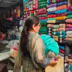 Here I am in my favorite yarn shop, picking out colors for my next orders.