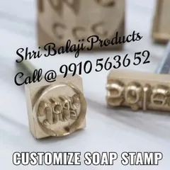 For a classic, handcrafted feel, I create custom metal soap stamps. This close-up shows the fine detail I can achieve with your logo, allowing you to press your brand mark directly onto your soap bars for a premium finish.