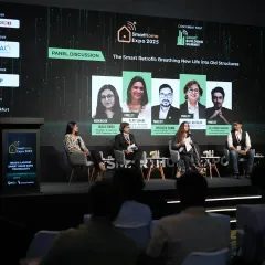 Experts on stage for the Smart Building Summit discuss "The Smart Retrofit," breathing new life into old structures with modern technology.
