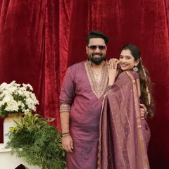 The joy on their faces says it all. It was an honor to be a part of their celebration by designing these custom outfits.