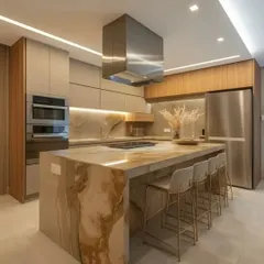 This kitchen is designed for both serious cooking and social gatherings, featuring a stunning marble-finish island with seating. We focused on a premium feel with integrated appliances, handleless cabinetry, and layered lighting for a kitchen that is as beautiful as it is functional.
