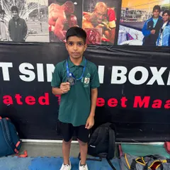 Young champion Sarthak with his silver medal from the CBSE North Zone Boxing Championship. I focus on building a strong foundation of discipline and skill in my youngest fighters.