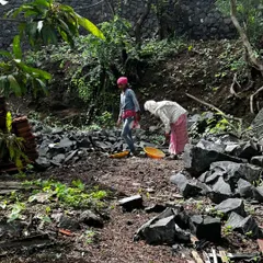 A moment captured on-site in Alibaug. This image shows the groundwork and material handling that forms the foundation of every project, highlighting the manual effort involved in shaping the landscape and preparing for construction.