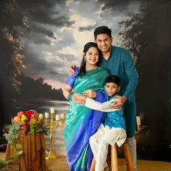 A beautiful family portrait. It's so important to capture this moment in time before the family grows by one more.