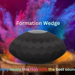 The Bowers & Wilkins Formation Wedge is a perfect example of a statement piece. Its unique 120-degree elliptical shape is designed to deliver room-filling, true stereo sound from a single, stylish unit, compatible with all major streaming services.