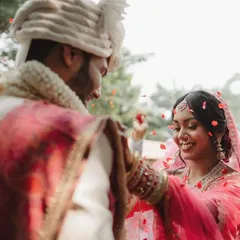 A stolen glance between the bride and groom during the ceremony. These quiet, intimate moments are just as important as the grand celebrations.