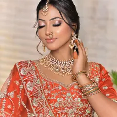A candid moment that highlights the hathphool and bangles, showing how I can provide a complete set of coordinated jewellery for your hands, tying the whole look together.