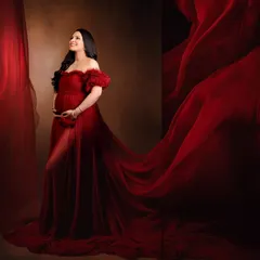 For the bold and radiant mother-to-be. We use vibrant colors and flowing fabrics to create dramatic, high-fashion maternity portraits that celebrate your strength and confidence.