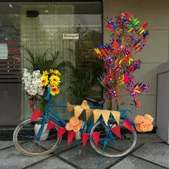 A quirky and fun prop for a Mehndi or birthday party. This decorated bicycle with flowers, pinwheels, and buntings makes for a great photo opportunity.