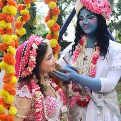 A beautiful moment captured between Radha and Krishna. This look was created for a Janmashtami celebration, showcasing the divine love between them.