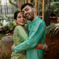 A day filled with endless smiles and laughter. We capture the fun, quirky moments that make your relationship unique, like this playful pose between the happy couple.