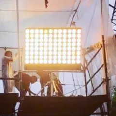 This is the iconic 'Wendy Light,' a custom tungsten fixture I designed 27 years ago for the film 'Holy Smoke'. It's a testament to my philosophy of innovating to meet a project's needs, a legacy that continues in all our custom builds.