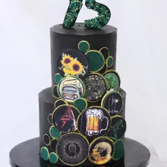 A truly special cake for a 75th birthday, designed to be as evergreen as the person celebrating. This two-tiered black cake is decorated with custom edible prints showcasing their favorite things, from sunflowers and beer to travel and music.