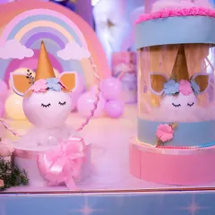Adorable unicorn-themed decor pieces. The smaller unicorn head is made from a styrofoam base, and the larger one is a custom-made return gift holder.