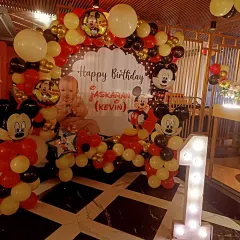 Another angle of the vibrant Mickey Mouse party decor. We focus on creating a cohesive and immersive environment, ensuring every corner of the venue reflects the chosen theme.