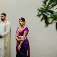 An artistic composition creating a sense of anticipation and distance. We use creative framing to add a layer of narrative to our couple portraits.