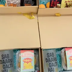 A peek inside our quirky Oktoberfest hampers. We included fun items like beer-themed coasters and mugs with the phrase 'Sab Daaru Ki Galti Hai' (It's all the alcohol's fault).