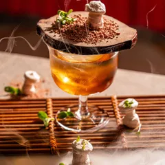 A whimsical, mushroom-themed cocktail presented with dry ice. We excel at capturing theatrical and highly creative cocktails that are designed to be photographed.