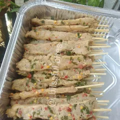 My Indo-Chinese style Satay Chicken skewers, marinated and ready to be cooked. These chicken strips are packed in a foil tray for your convenience.
