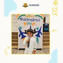 A young child confidently holds the microphone during our Independence Day celebration. Events like these are a great opportunity for children to build public speaking skills and express their patriotism.