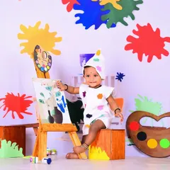 A little artist at work in a colorful paint-splatter studio. This theme is full of energy and perfect for capturing a child's creative side.