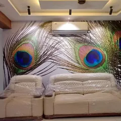 This living room features a bold and vibrant mural of peacock feathers. The iridescent colors and larger-than-life scale create a stunning and luxurious focal point.