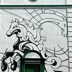 I can switch up the style to match the vibe of any space. For this iconic building at the Mahalaxmi Racecourse, we went with a minimal, powerful line art mural of horses, proving that graffiti can be both elegant and bold.