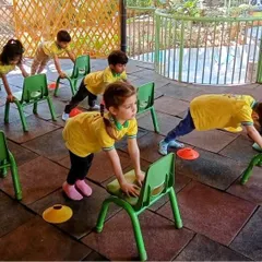 Building upper body strength with a fun chair exercise. We incorporate physical activity into our daily routine in creative ways to keep children moving and healthy.
