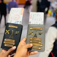 Travel with a friend or partner in style with these matching personalized passport covers. Both are customized with names and travel-themed charms like an airplane, camera, and the Eiffel Tower.