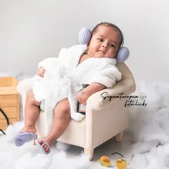 Spa day for the little boss. This fun and quirky theme is perfect for showing off your baby's personality, complete with a tiny bathrobe, cucumber slices, and a look of pure relaxation.