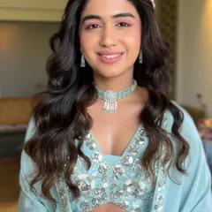 My bride Serena in her Haldi glow. We added a pop of pink on the eyes to complement her beautiful light blue outfit.