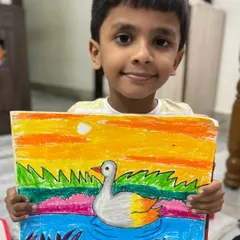 Another take on the duck at sunset, this piece by a first-grader shows how each child brings their unique touch to the same subject. I celebrate every student's individual style and progress.