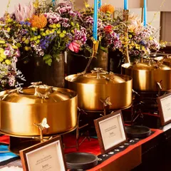 Our stunning gold butterfly chafing dishes, filled with modern Indian main courses like Junglee Maas, for a party hosted by designers Shivan & Narresh.