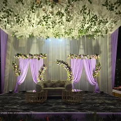 For a client who wanted a unique color theme, I designed this lavender wedding stage. The decor features a ceiling of hanging white flowers, purple drapes, and matching floral arrangements on the stage.