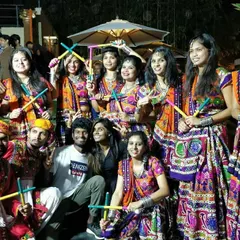 A happy group photo with the Dandiya Raas performers after their successful corporate event. I love working with corporate teams and seeing them come together to create something amazing.