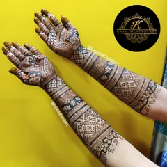 This engagement bride wanted a heavy Indian design without any figures. I added subtle ring elements on the back of the hands to give it that special engagement touch.