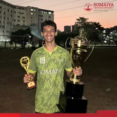 We believe in celebrating both team victories and individual brilliance. Here, a player is recognized with the Player of the Tournament and the championship trophy at the Vanquish 2026 football event.