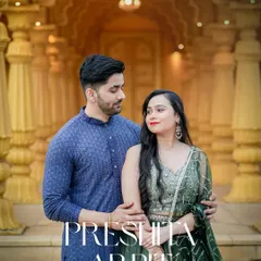 For a touch of royalty, I use heritage locations with intricate designs. This couple's portrait, set against a golden, palace-style backdrop, highlights their traditional attire and creates a timeless, regal photograph.