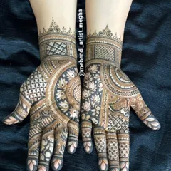 A beautiful and balanced design that mixes different patterns like checkerboards, florals, and paisleys. The use of negative space makes the intricate work stand out.
