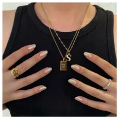 A close-up of our beautiful pearl chrome nails. This effect gives a clean, minimalist look with a high-fashion, iridescent shine that catches the light perfectly.
