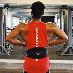 A well-defined back is the foundation of a powerful physique. This back double-bicep pose showcases the results of consistent pull-ups, rows, and deadlifts.