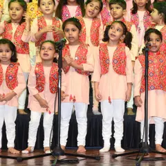A close-up of our little stars during a stage performance. We ensure they are dressed in beautiful costumes to make the experience even more special for them.