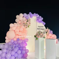 A closer look at the pastel balloon garland for an outdoor birthday party. We use high-quality balloons and secure construction techniques to ensure our decorations look great and hold up in an open-air environment.