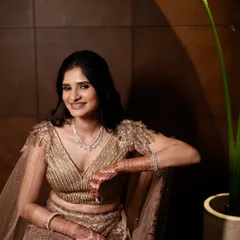 A vision of grace for an engagement ceremony. This soft look with a golden glow and subtle makeup is all about timeless charm and celebrating the start of a beautiful forever.